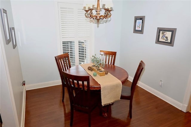 3444 Texas Ave, Kenner, LA 70065 - dining room featuring wood finished floors, a chandelier, and baseboards