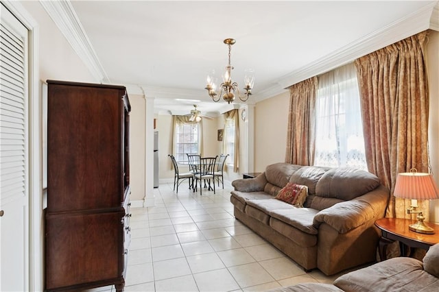 4909 Sunny Pl, Metairie, LA 70006 - living area with light tile patterned floors, a chandelier, crown molding, healthy amount of natural light, and baseboards