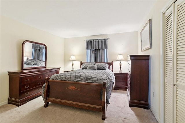 4909 Sunny Pl, Metairie, LA 70006 - bedroom with carpet floors, a closet, and baseboards