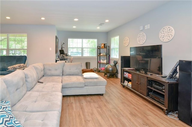141 Audubon Dr, Mandeville, LA 70471 - living area featuring light wood-style flooring and recessed lighting