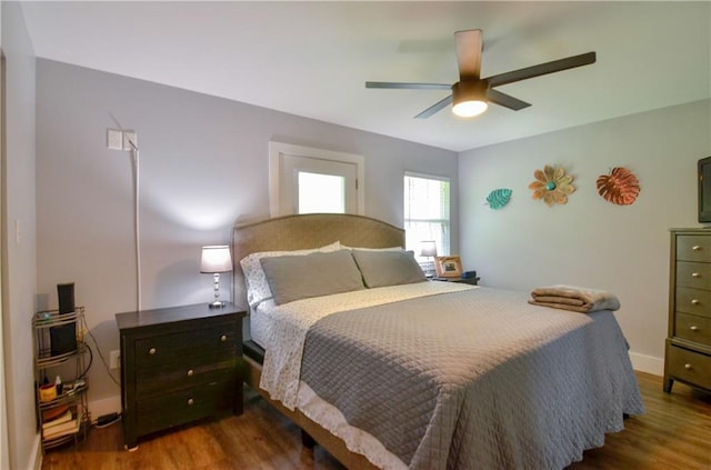 141 Audubon Dr, Mandeville, LA 70471 - bedroom featuring wood finished floors and a ceiling fan