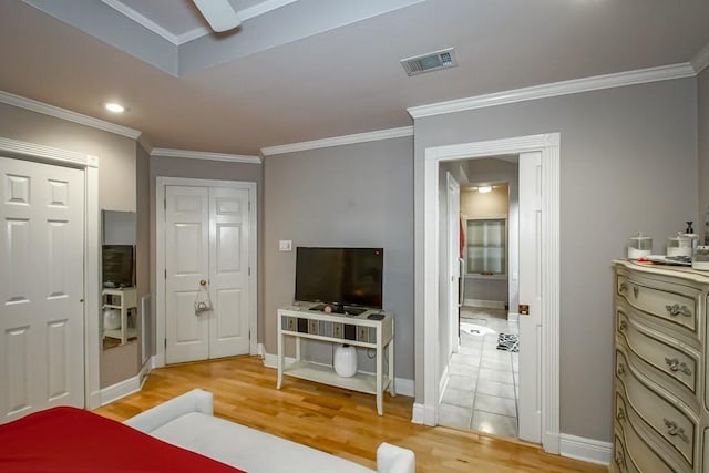 6300 W Metairie Ave, Metairie, LA 70003 - bedroom with light wood-type flooring and crown molding