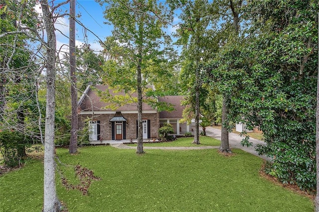 240 Silver Maple Dr, Mandeville, LA 70471 - view of front of property featuring a front lawn and concrete driveway