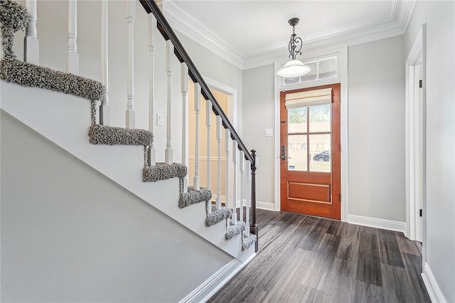 240 Silver Maple Dr, Mandeville, LA 70471 - entrance foyer with wood finished floors, baseboards, stairs, and crown molding