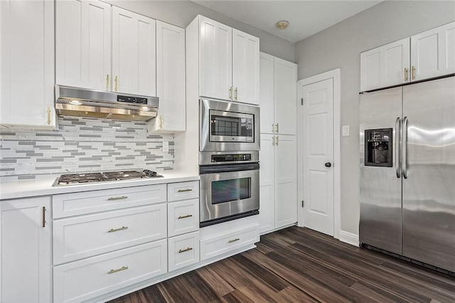 240 Silver Maple Dr, Mandeville, LA 70471 - kitchen with appliances with stainless steel finishes, exhaust hood, dark wood-type flooring, and white cabinets