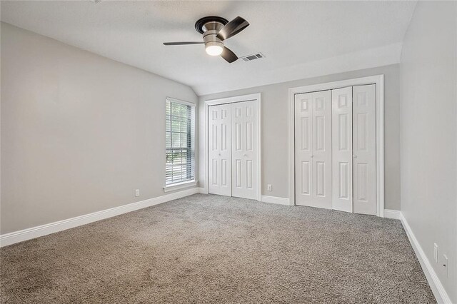 240 Silver Maple Dr, Mandeville, LA 70471 - unfurnished bedroom featuring multiple closets, carpet, and baseboards