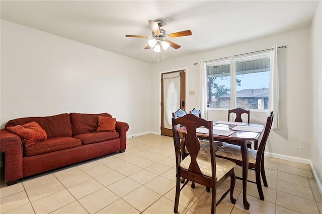 2716 Volpe Dr, Chalmette, LA 70043 - dining space with ceiling fan, light tile patterned floors, and baseboards