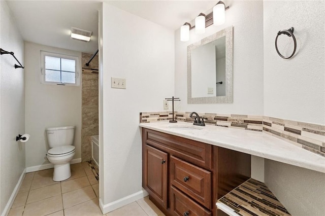2716 Volpe Dr, Chalmette, LA 70043 - full bath featuring vanity, toilet, bathtub / shower combination, baseboards, and tasteful backsplash