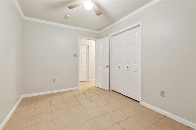 2716 Volpe Dr, Chalmette, LA 70043 - unfurnished bedroom with light tile patterned flooring, ornamental molding, baseboards, a closet, and ceiling fan