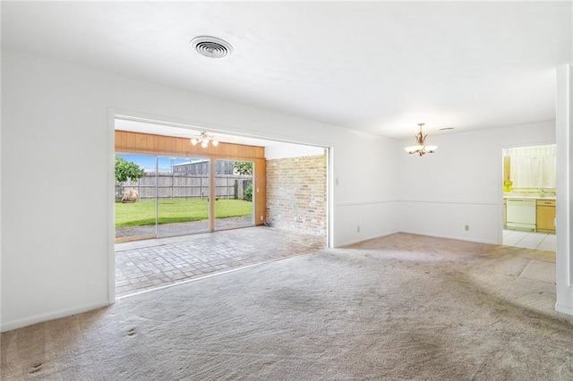 3410 Plymouth Pl, New Orleans, LA 70131 - spare room with a chandelier, carpet flooring, and baseboards
