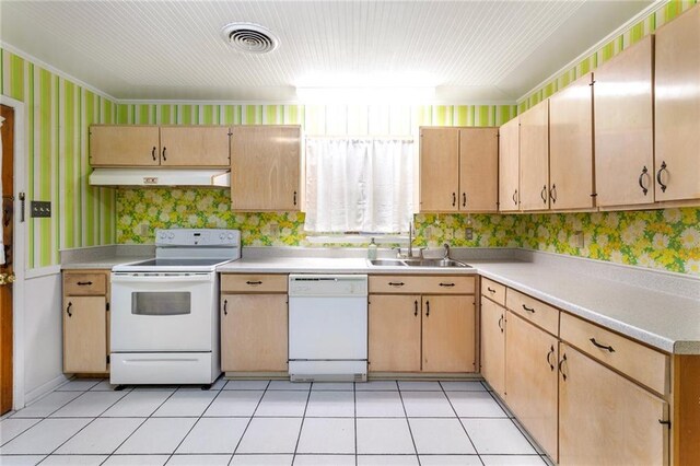 3410 Plymouth Pl, New Orleans, LA 70131 - kitchen featuring white appliances, under cabinet range hood, wallpapered walls, light countertops, and a sink
