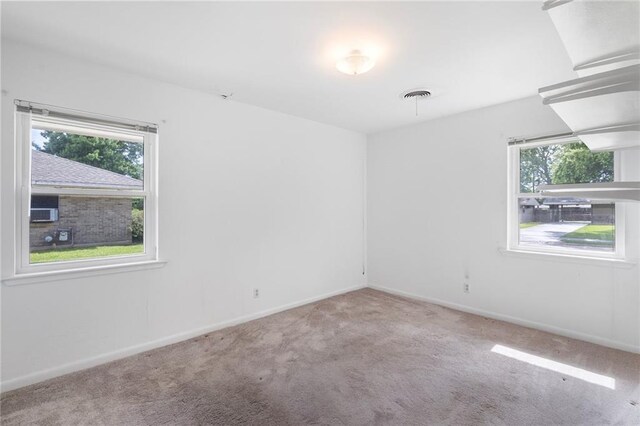 3410 Plymouth Pl, New Orleans, LA 70131 - carpeted empty room with healthy amount of natural light and baseboards