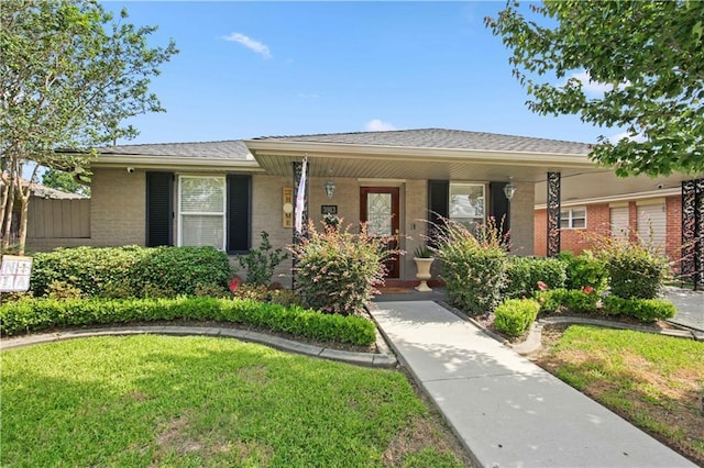 3913 Bellview St, Metairie, LA 70002 - single story home featuring covered porch, brick siding, and a front yard