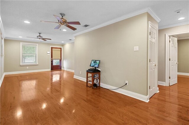 3913 Bellview St, Metairie, LA 70002 - empty room featuring ornamental molding, a ceiling fan, recessed lighting, wood finished floors, and baseboards