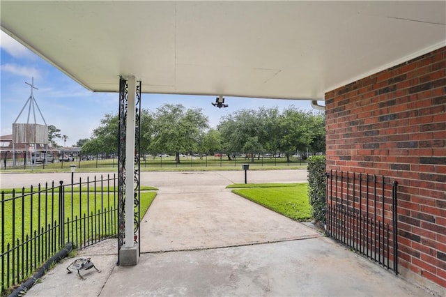 4811 Perelli Dr, New Orleans, LA 70127 - view of patio / terrace with concrete driveway