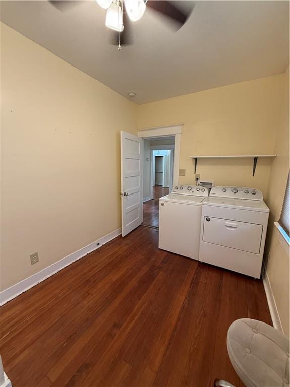 4218 S Liberty St, New Orleans, LA 70115 - laundry room featuring washer and dryer, a ceiling fan, dark wood-style flooring, and baseboards