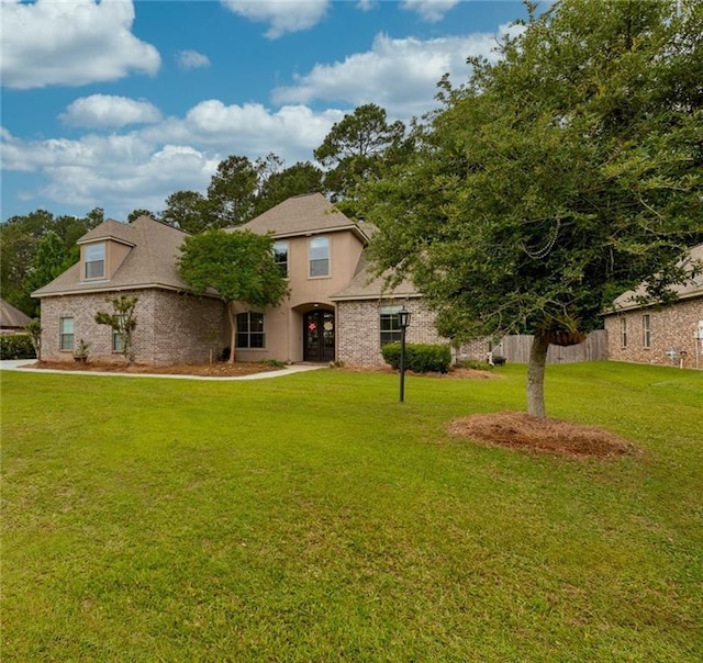 1180 Brook Ct, Mandeville, LA 70448 - view of front of home with brick siding
