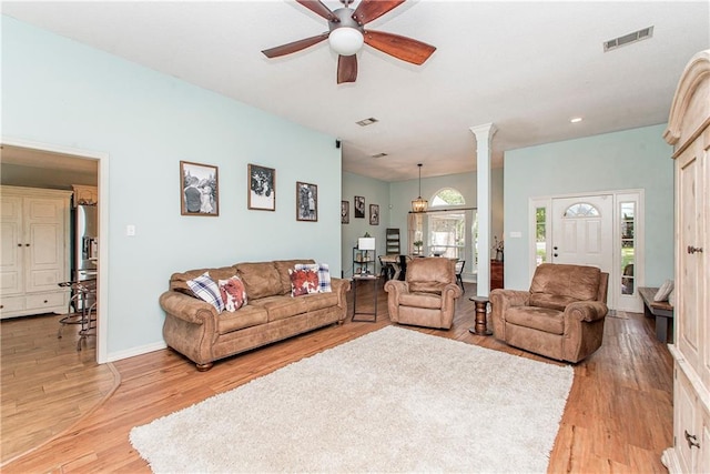 47380 Cardinal Dr, Franklinton, LA 70438 - living room featuring ceiling fan, light wood finished floors, ornate columns, and recessed lighting