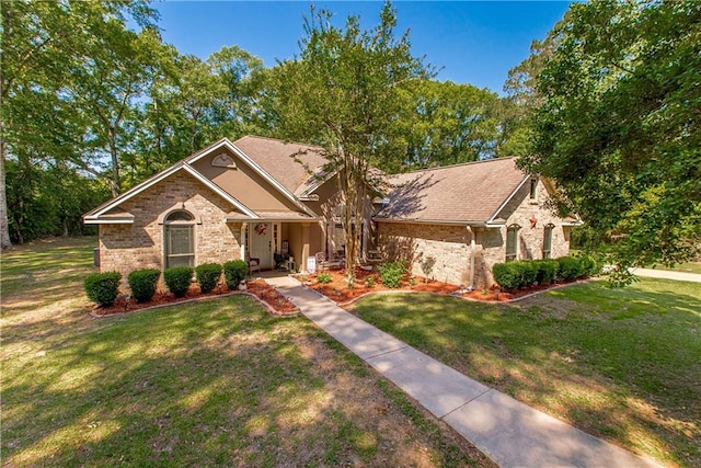 47380 Cardinal Dr, Franklinton, LA 70438 - view of front of property featuring a front yard and brick siding