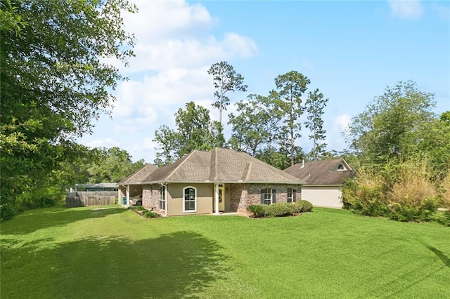 1216 W 23rd Ave, Covington, LA 70433 - back of house featuring stucco siding
