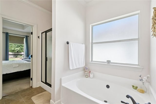 1216 W 23rd Ave, Covington, LA 70433 - ensuite bathroom featuring a garden tub, a shower stall, ornamental molding, and tile patterned flooring