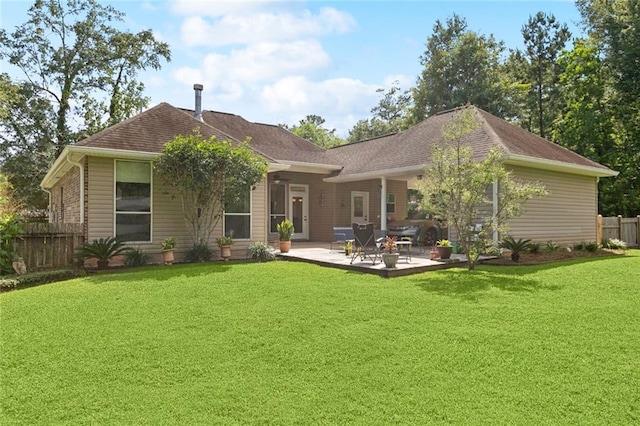 1216 W 23rd Ave, Covington, LA 70433 - back of house with a patio and a shingled roof