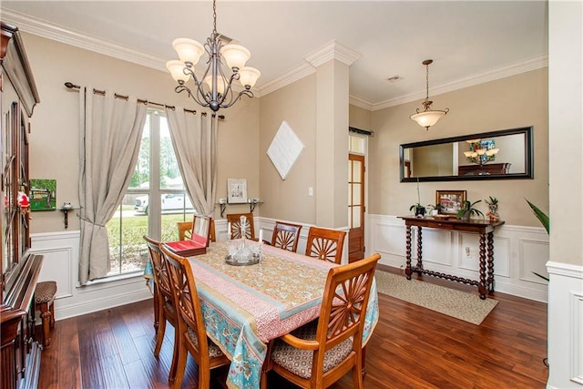 39749 Mark Ct, Ponchatoula, LA 70454 - dining room featuring a chandelier, dark wood-type flooring, crown molding, and wainscoting