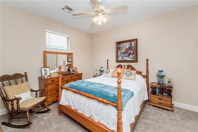 39749 Mark Ct, Ponchatoula, LA 70454 - bedroom with light colored carpet, baseboards, and a ceiling fan