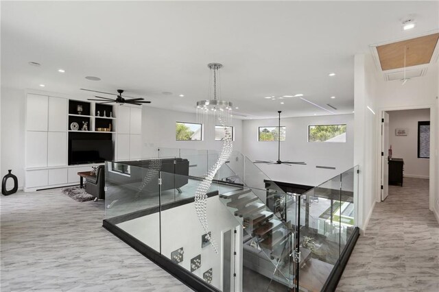 1900 Giuffrias Ave, Metairie, LA 70001 - staircase with attic access, ceiling fan, marble finish floors, and recessed lighting