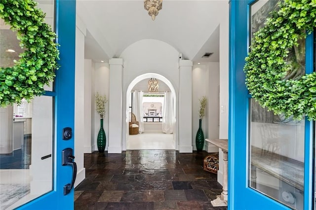 4 N Azalea Dr, Covington, LA 70433 - entrance foyer featuring baseboards, vaulted ceiling, and stone finish floors