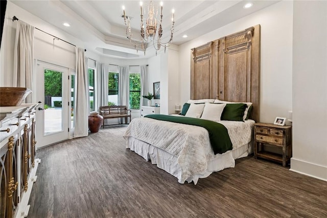 4 N Azalea Dr, Covington, LA 70433 - bedroom featuring a chandelier, a tray ceiling, access to outside, dark wood-style floors, and recessed lighting