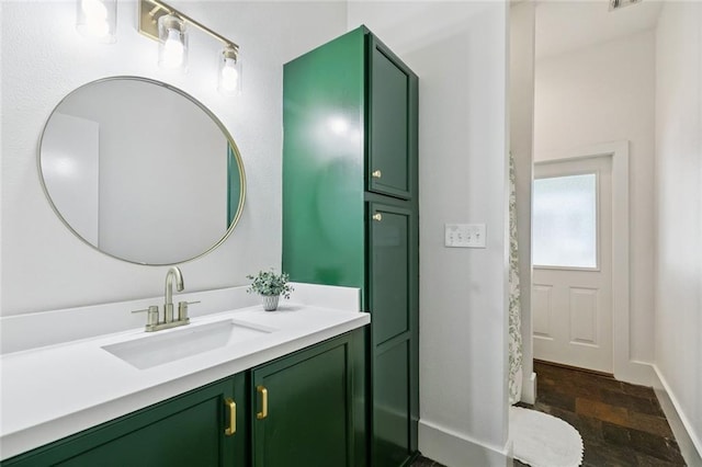 4 N Azalea Dr, Covington, LA 70433 - full bathroom featuring stone finish flooring, vanity, and baseboards