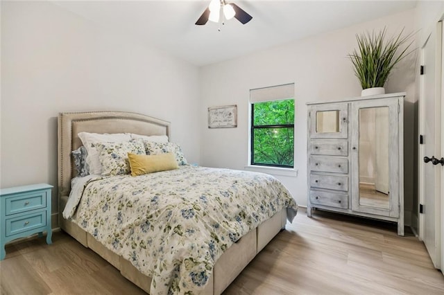4 N Azalea Dr, Covington, LA 70433 - bedroom with light wood-type flooring and a ceiling fan