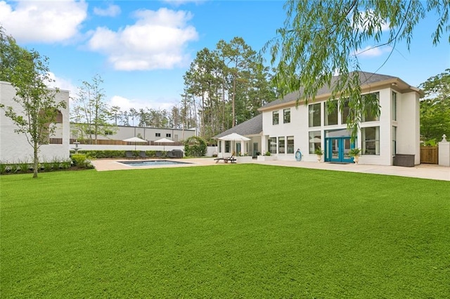 4 N Azalea Dr, Covington, LA 70433 - back of house featuring a patio, french doors, a jacuzzi, and stucco siding
