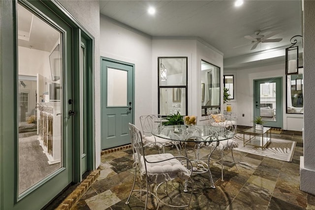 4 N Azalea Dr, Covington, LA 70433 - dining area featuring stone tile floors, a ceiling fan, and recessed lighting