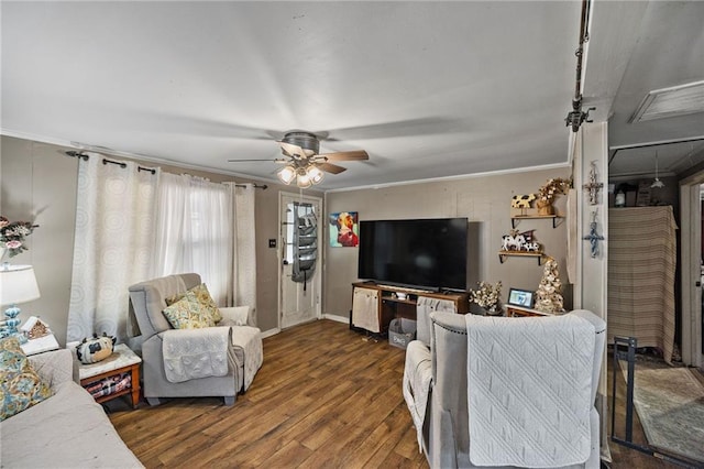 72272 Gurtner Dr, Abita Springs, LA 70420 - living area featuring wood finished floors, crown molding, ceiling fan, and baseboards