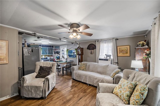72272 Gurtner Dr, Abita Springs, LA 70420 - living area with wood finished floors, crown molding, ceiling fan, and cooling unit