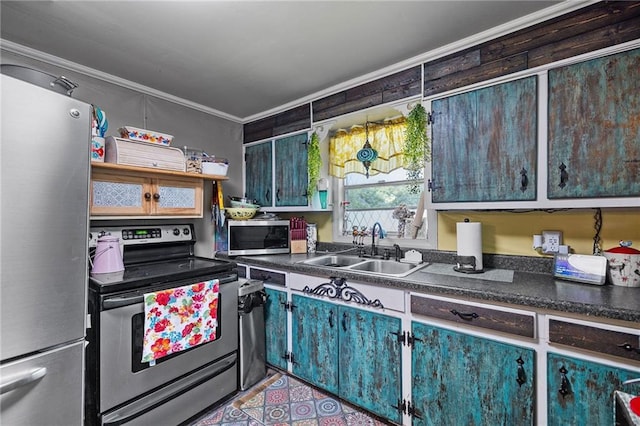 72272 Gurtner Dr, Abita Springs, LA 70420 - kitchen with appliances with stainless steel finishes, a sink, dark countertops, and ornamental molding