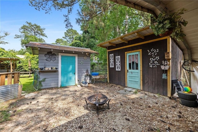 72272 Gurtner Dr, Abita Springs, LA 70420 - view of outdoor structure with a fire pit