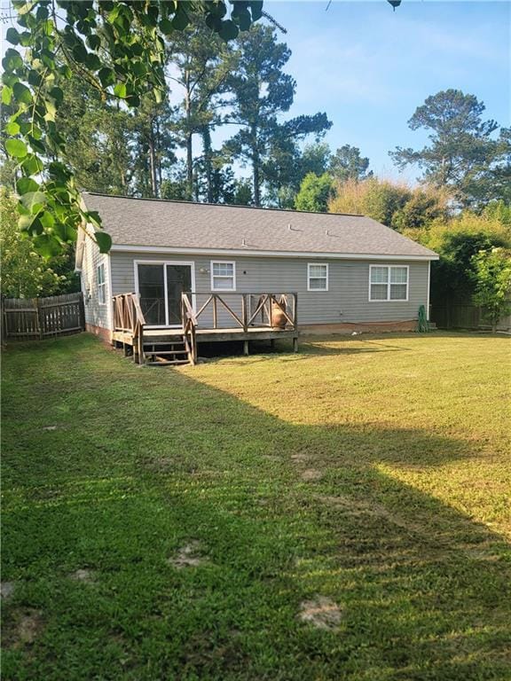 1438 Jasmine St, Mandeville, LA 70448 - back of property with a deck and crawl space