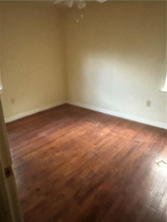 135 Bernice Ln, Ponchatoula, LA 70454 - spare room with dark wood finished floors and baseboards