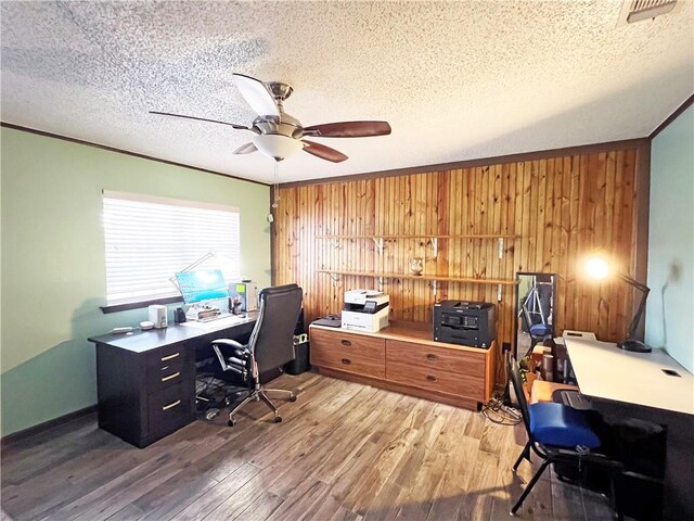 1912 Bullard Ave, Metairie, LA 70003 - kitchen with stainless steel gas range, wall chimney exhaust hood, light marble finish flooring, light countertops, and brown cabinetry