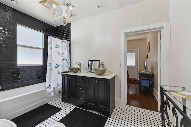 7328-30 Spruce St, New Orleans, LA 70118 - bathroom featuring shower / tub combo, a chandelier, vanity, and tile patterned floors