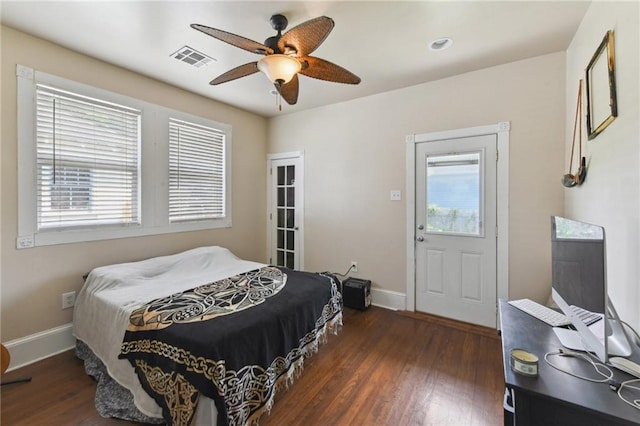 7328-30 Spruce St, New Orleans, LA 70118 - bedroom featuring multiple windows, wood finished floors, baseboards, and a ceiling fan