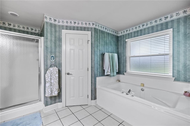 18332 Honeysuckle Dr, Ponchatoula, LA 70454 - bathroom with wallpapered walls, tile patterned floors, a stall shower, a bath, and baseboards