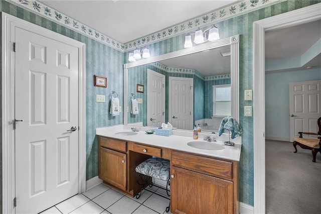 18332 Honeysuckle Dr, Ponchatoula, LA 70454 - full bathroom featuring wallpapered walls, double vanity, a bathtub, and tile patterned flooring