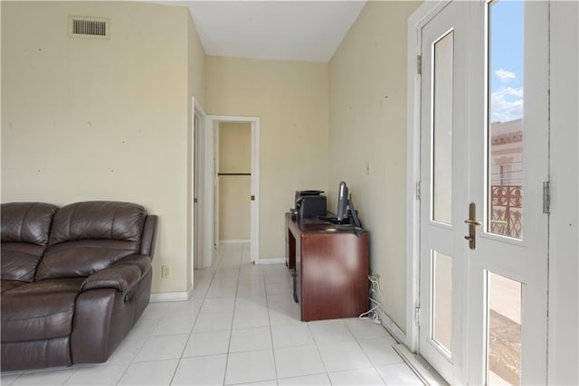 330 Morgan St Unit 201, New Orleans, LA 70114 - living area with light tile patterned flooring and baseboards