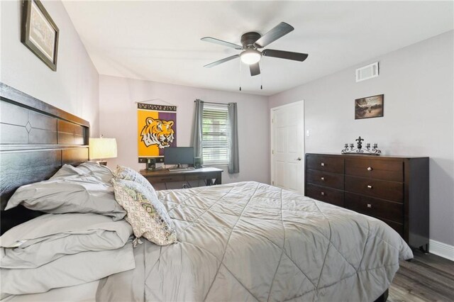 91 Rosedown Dr, Destrehan, LA 70047 - bedroom with wood finished floors, baseboards, and a ceiling fan