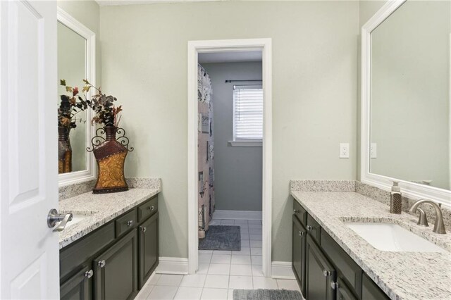 91 Rosedown Dr, Destrehan, LA 70047 - bathroom with vanity, tile patterned flooring, and baseboards