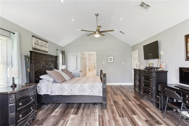 91 Rosedown Dr, Destrehan, LA 70047 - bedroom featuring wood finished floors, lofted ceiling, baseboards, ceiling fan, and connected bathroom